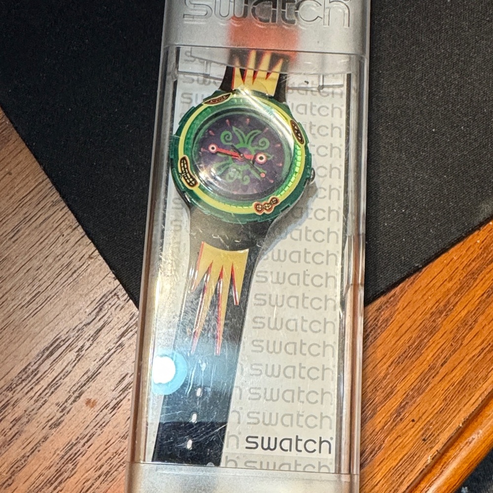 Swatch Vibrant Black and Green Timepiece